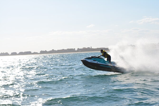 1 Hour Jet Ski Experience in Isla Canela - The return plan: open-sea swim, then coastal run back to base