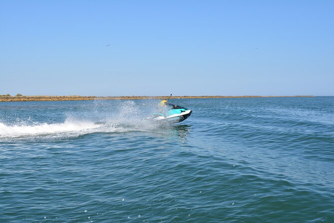 1 Hour Jet Ski Experience in Isla Canela - Price and value: $202.75 per group, per motorcycle (up to 2 people)