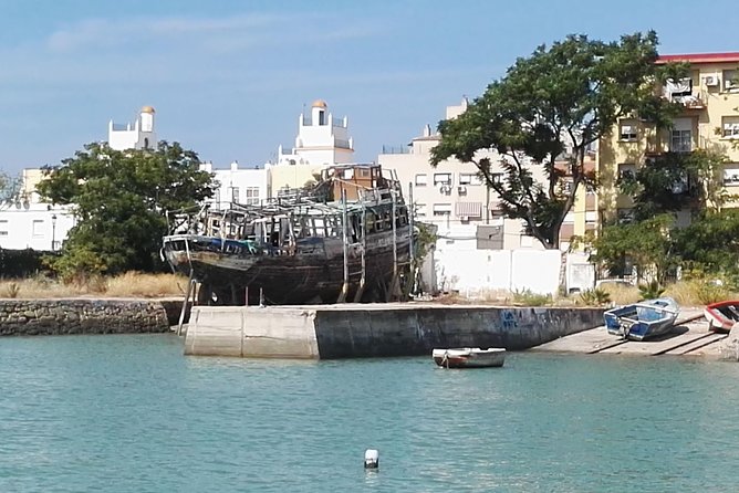 3-hour boat ride through the Bay of Cadiz - Beach Anchoring: Swim Time Plus Paddle Surfing Options