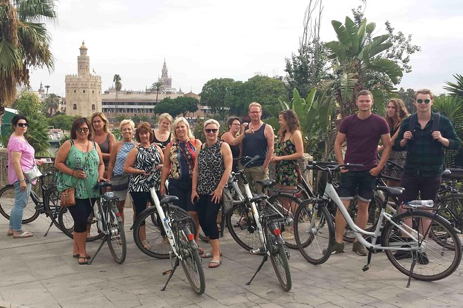 3-hour Guided Bike Tour along the Highlights of Seville - Parque de María Luisa: gardens for photos, a coffee break, and the calmer side of Seville