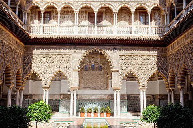 Alcazar of Seville with Cathedral & Giralda English Tour - Getting Your Bearings at Plaza del Triunfo and Calle Miguel Mañara