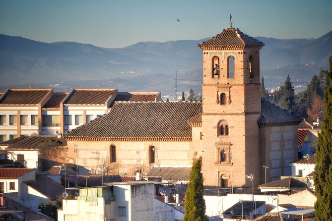 Alhambra Private Tour & Nazaries Palaces from Seville with Pickup - Albaycin on foot: markets, mountain views, and the San Nicolas moment