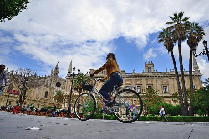 Bike rental in Seville city centre - Helmet, padlock, and baby seat options that reduce stress