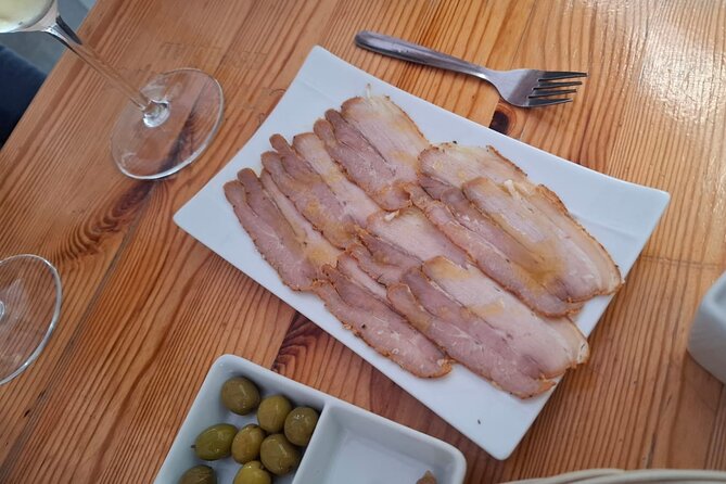 Cadiz Food Tour: Tapas, Drinks and Delights with a Local - Plaza de San Antonio and Papas Aliñás, Simple Food With a Clear Point