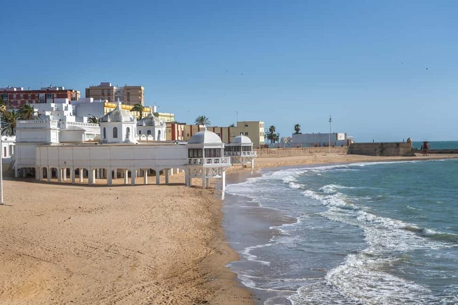 Cádiz TukTuk Tour with Audioguide - La Caleta Beach, Gran Teatro Falla, and Parque Genovés for the emotional mix