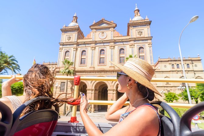 City Sightseeing Seville Hop-On Hop-Off Bus Tour - Audio Commentary, QR Scanning, and Avoiding Boarding Headaches