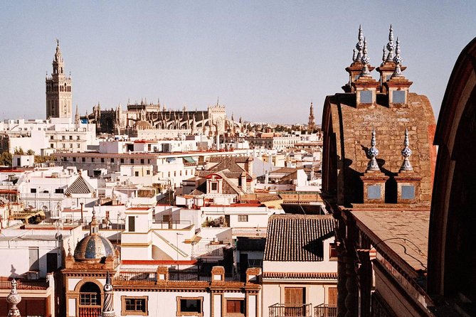 Complete Triana Tour "Corrales included". - Betis and San Jacinto streets, the fishing port feel, and Triana Bridge