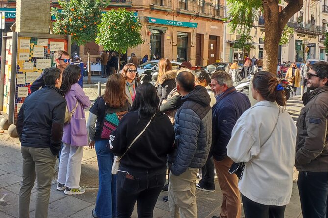 Complete Triana Tour "Corrales included". - Starting at Torre del Oro, then crossing bridges toward Triana