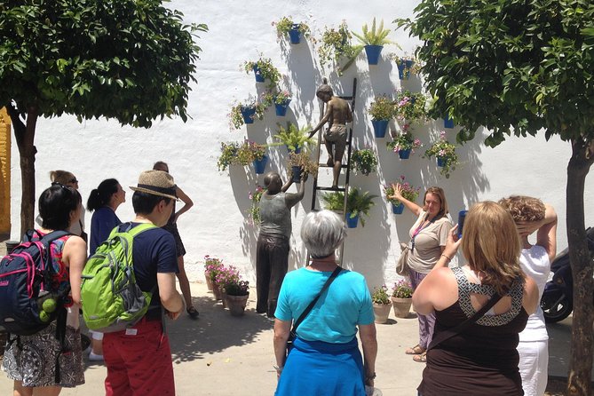 Cordoba & & The Mosque Small-Group Day Tour from Seville - La Juderia First: Colored Streets, Flowered Courtyards, and a Guided Way In