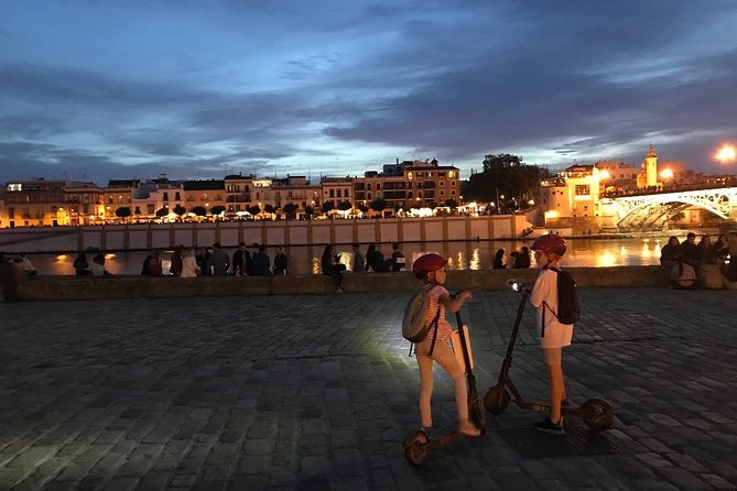 Electric Scooter Rental Seville - Bullring views, Triana bridge, and the Triana side of Seville