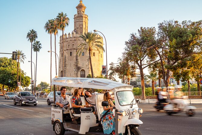 Express Tour of Seville in Private Eco Tuk Tuk - Plaza de América and Torre del Oro: ending at the Guadalquivir River edge