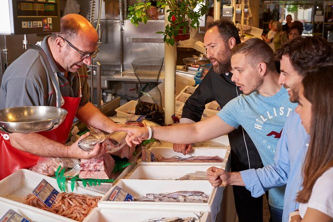 Feed the Fire Private Cooking Class & Market Tour - The short walk to the wine shop kitchen