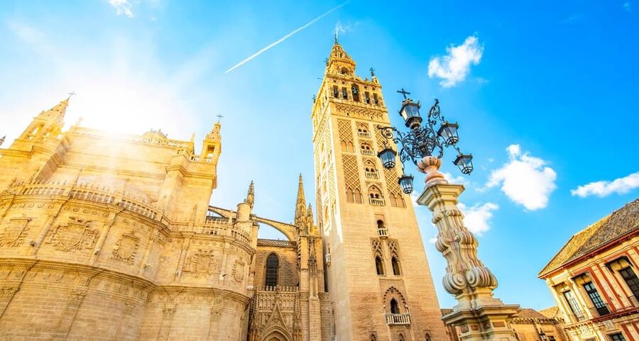From Costa del Sol: Guided Tour of Seville - Seville Cathedral Interior: Where Gothic Detail Meets the Columbus Story