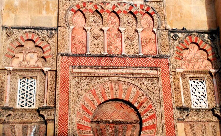 From Seville: Full-Day Essential Córdoba Tour - Córdoba walking tour: Jewish Quarter, San Bartolomé, and the Door of Almodóvar
