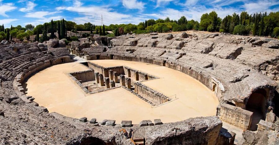 From Seville: Half-Day Guided Bike Trip to Italica - Santiponce culture stop: traditions, local village energy, and breakfast options
