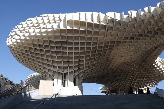 Guided walking tour to Setas, La Macarena and Dueña's Palace in Seville - San Juan de la Palma and the street-market feel you can’t get from photos