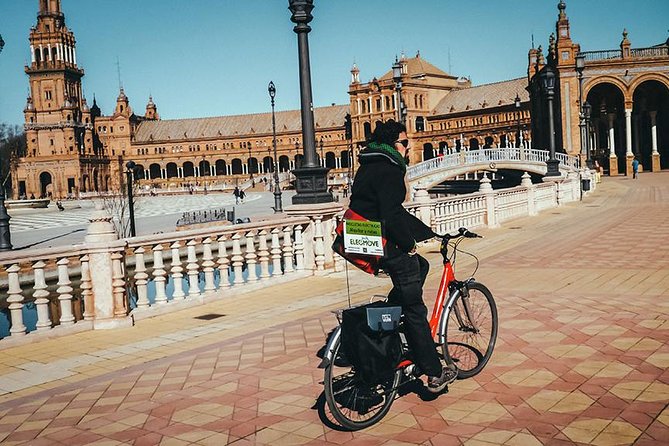 Highlights Electric Bike Tour - Golden Tower to Triana Bridge: two sides of the same river story
