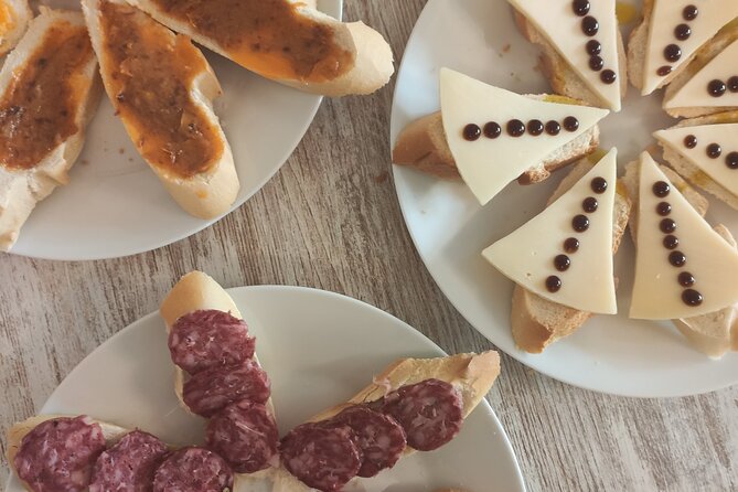 Indulge in Cordoba: Local Wines & Tapas Tasting - Taking bottles home, since the shop is right there