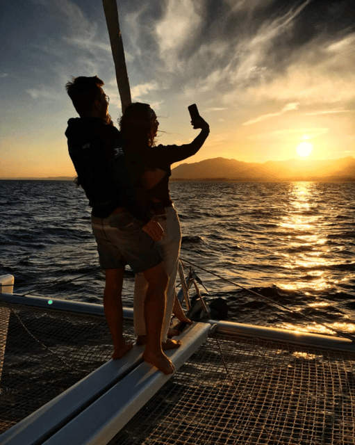 Marbella: Group Dolphin Watching Catamaran Tour with Snacks - Swim Stops and Water Toys, Only If Conditions Let You