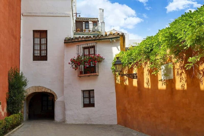 Private Guided Tour of Complete Seville and Jewish Quarter - El Arenal and the Guadalquivir Riverfront: commerce, social life, and the Maestranza