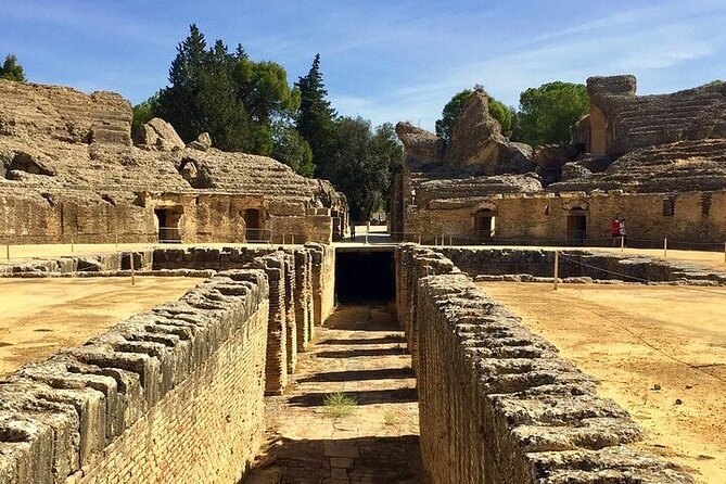 Private hald day tour to the historic roman city of Italica - Stop 1 at Anfiteatro de Italica: Amphitheatre, Mosaics, and a Medieval Monastery