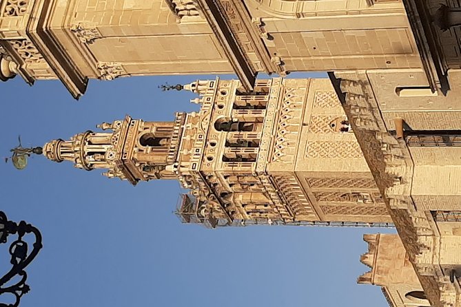Private visit Cathedral and Royal Alcazares of Seville - Giralda: Almohad Minaret, Giraldillo, and 32 Ramps to the Bells
