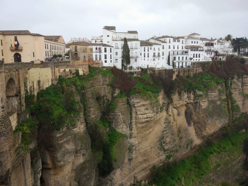 Pueblos Blancos & Ronda: Private Full-Day Tour from Seville - Zahara de la Sierra: Hilltop Views, Coffee Breaks, and an Olive Oil Factory Stop
