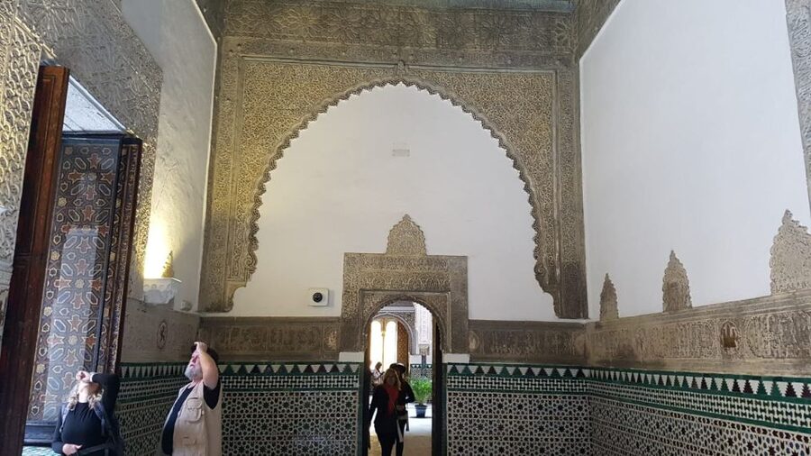 Royal Alcázar of Seville Skip-the-Line Guided Tour - Getting Oriented at Plaza del Triunfo (Orange Umbrella)