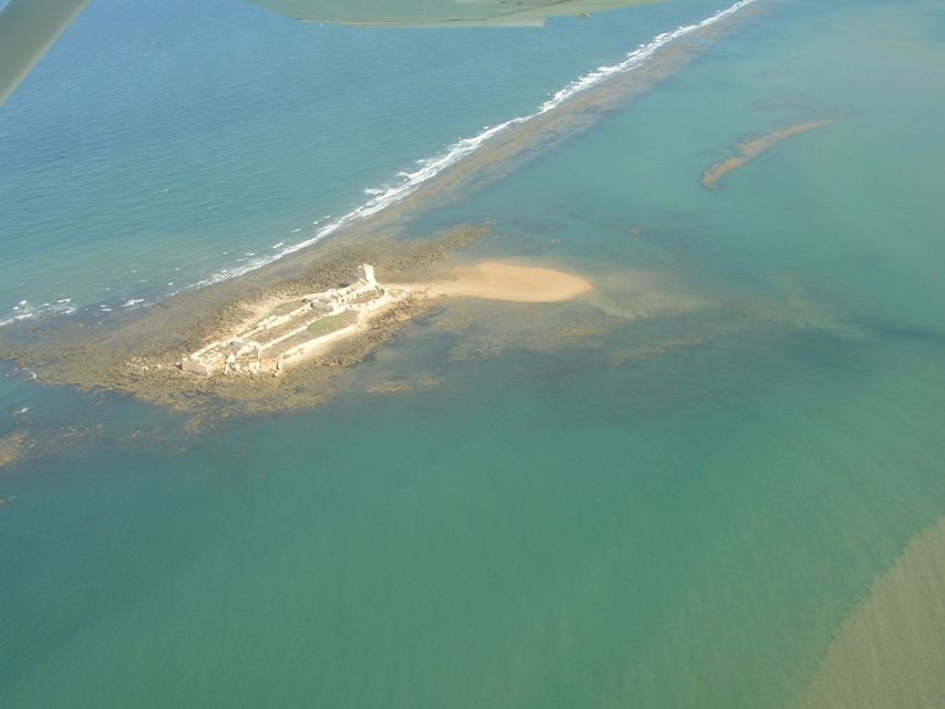 Sancti Petri: Catamaran Cruise with Swim Stop and lunch - Sinking into the bay: views across Chiclana, San Fernando, and Cadiz