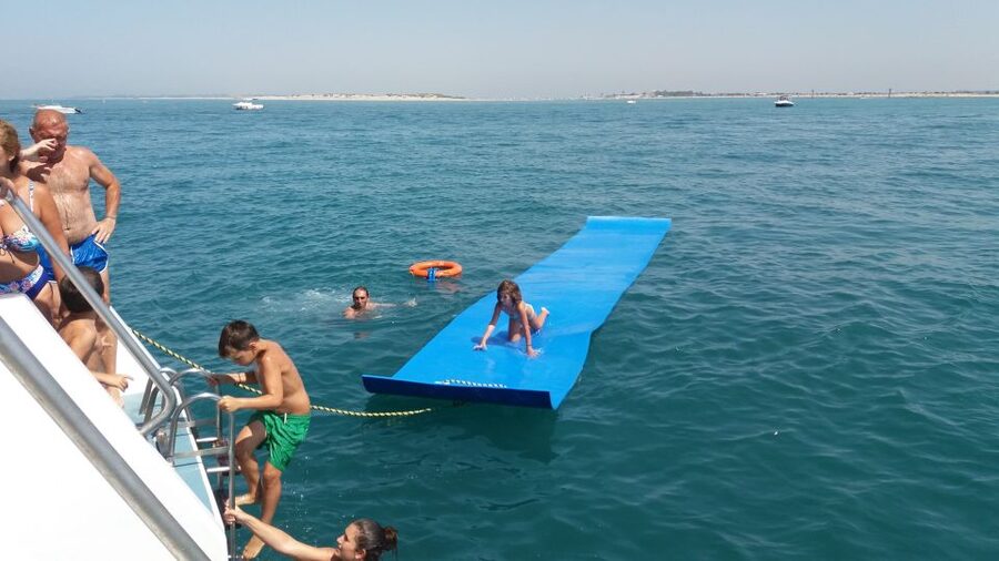 Sancti Petri: Catamaran Cruise with Swim Stop and lunch - Sancti Petri Castle stop: anchored swimming, water mats, and the slide