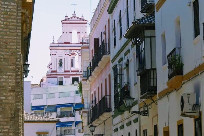 Sevilla Food Tour: Tapas, Wine, History & Traditions - Plaza del Pan: The quick stop that adds color and culture