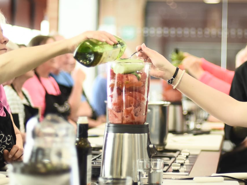 Seville: 3.5-Hour Spanish Cooking Class & Triana Market Tour - Triana Market, stalls 75-77, start your meal before the apron