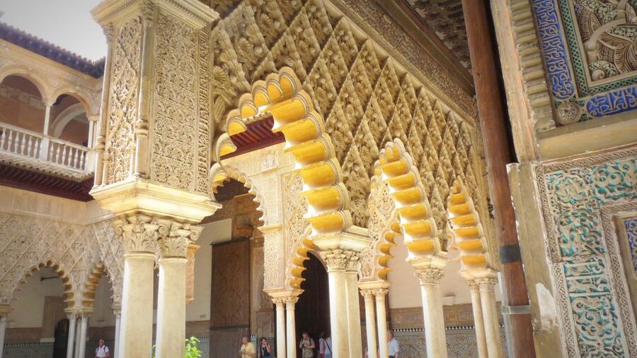 Seville: Alcazar, Cathedral, and Giralda Skip-the-Line Tour - The walk between monuments: Plaza Nueva, Constitution Avenue, and UNESCO context