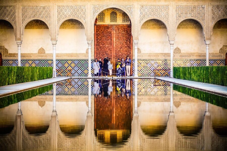 Seville: Alhambra Day Trip with Guide & Nasrid Palaces Entry - Generalife gardens: water, ponds, and a calm ending