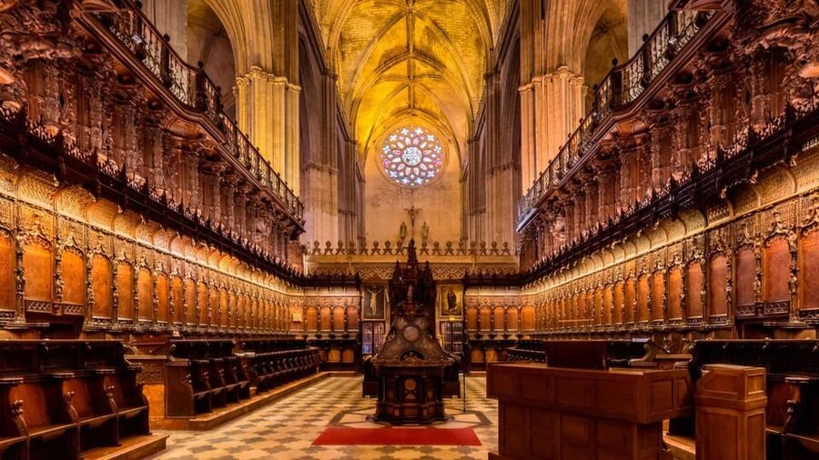 Seville Cathedral and Giralda Tower Guided Tour and Tickets - Seville Cathedral highlights: stained glass, art, and Columbus