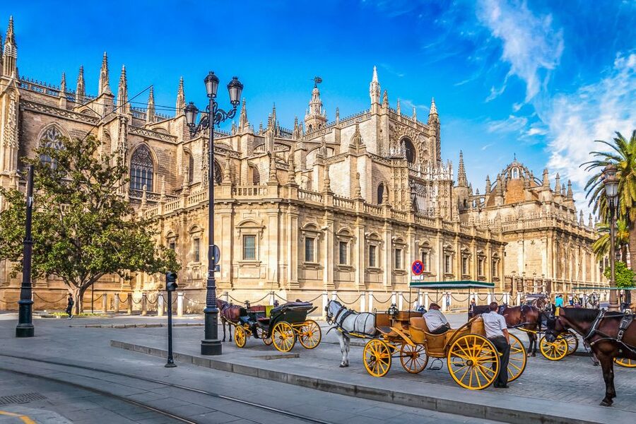 Seville: Cathedral and La Giralda Entry Ticket - Columbus’s tomb near the Puerta del Príncipe: what you’ll see and the debate