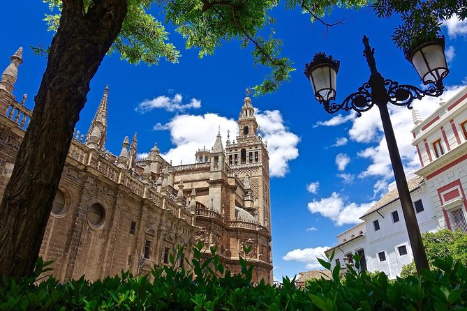 Seville: Cathedral Guided Tour with Priority Access - Climbing the Giralda: former minaret to Seville lookout