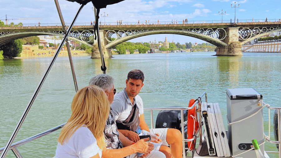 Seville: Guadalquivir River Boat Tour - Drinks, music, and the small comforts that make it feel easy