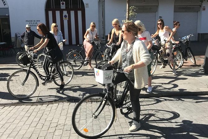 Seville Guided Bike Tour - Real Maestranza de Caballeria: river views and bullfighting history