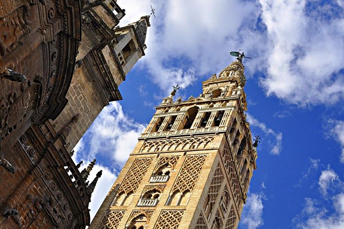 Seville Guided Tour into Alcazar and Cathedral Skip the Line - Torre Giralda: Climb for Views, Then Understand the Layers