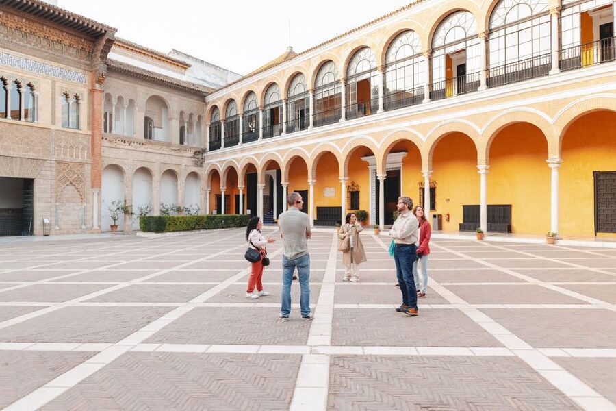 Seville: Guided Walking Tour with Alcazar & Cathedral Access - Santa Cruz streets in the Jewish Quarter, plus a well-timed pause