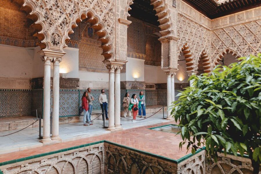 Seville: Guided Walking Tour with Alcazar & Cathedral Access - Giralda tower climb: optional views, included tickets, and timing choices