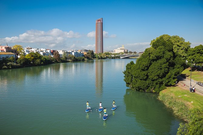 Seville: Paddle Surf Route and Class - From C. Betis to the Water, a simple setup that feels organized