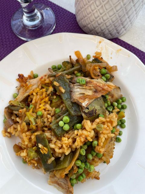 Seville: Paella and Sangria Experience - The paella cooking presentation: watching Sevilla-style technique unfold