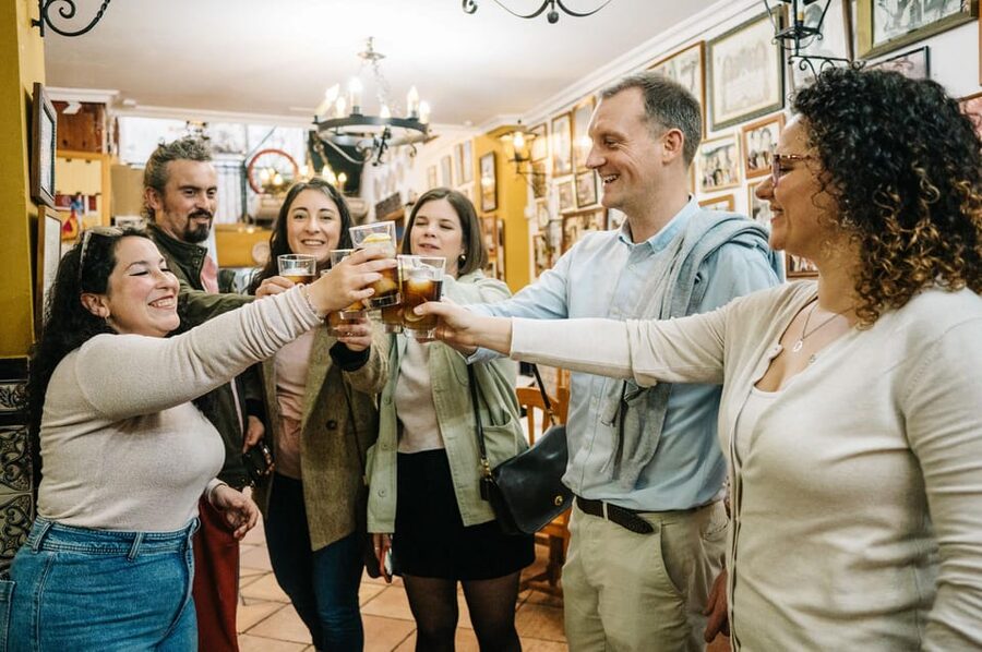 Seville: Private Tapas & History Tour in Triana Neighborhood - Bar Bistec to the finish: garlic shrimp and seasonal plates with local wine or beer
