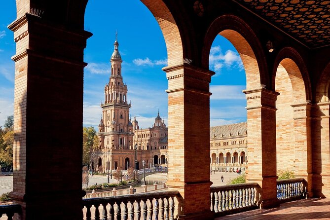 Seville Private Tour with Alcazar, Cathedral, Casa de Pilatos - Santa Cruz: cobblestones, iconic streets, and Plaza de España energy
