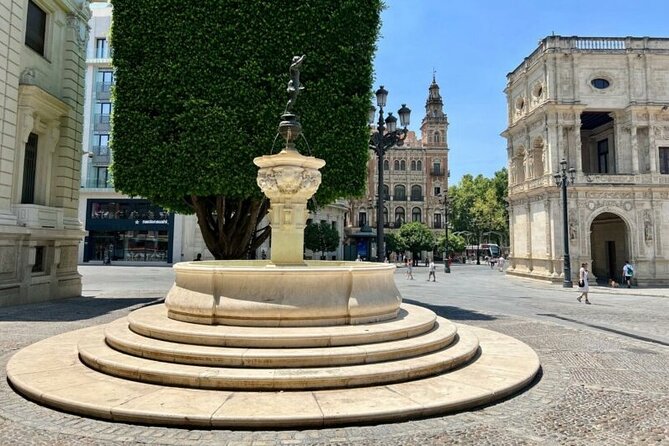 Seville Private Tour with Alcazar, Cathedral, Casa de Pilatos - Seville Cathedral and Giralda: Columbus, Gothic scale, and 105-metre views
