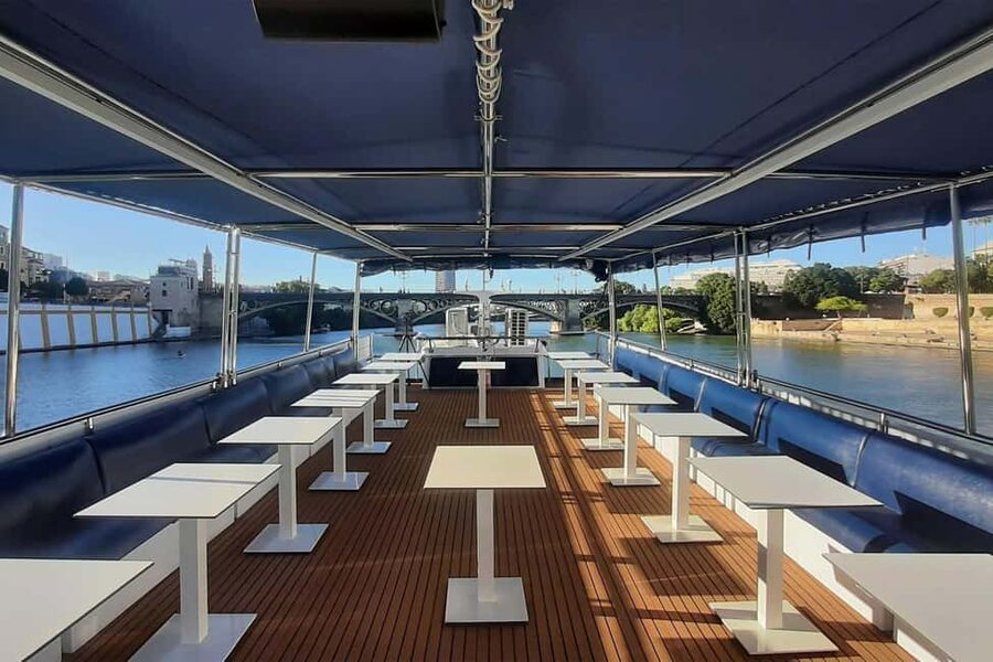 Seville: Restaurant boat ride on the Guadalquivir River with lunch/dinner - The Meal Plan: 5 Courses, Dessert, and Cava (Plus Drinks Until Dessert)