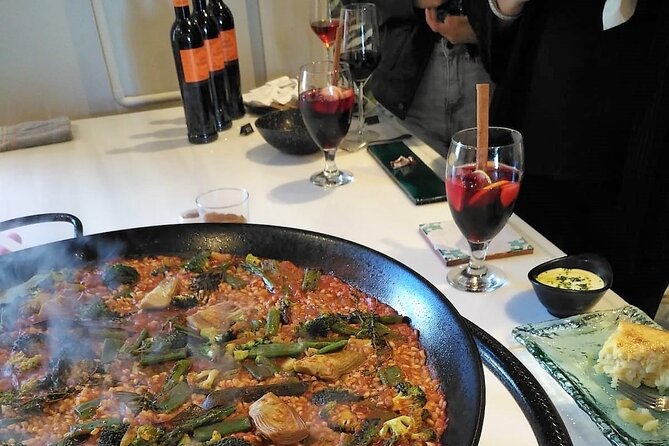 Seville: Rooftop Paella Showcooking and Sangría - Your 2.5 Hour Evening, From Meeting Point to Rooftop Meal