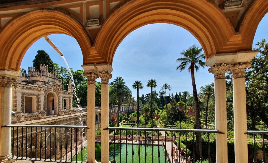 Seville: Royal Alcázar Skip-the-Line Tour by Local Experts - Patio de las Doncellas, where symmetry and power show
